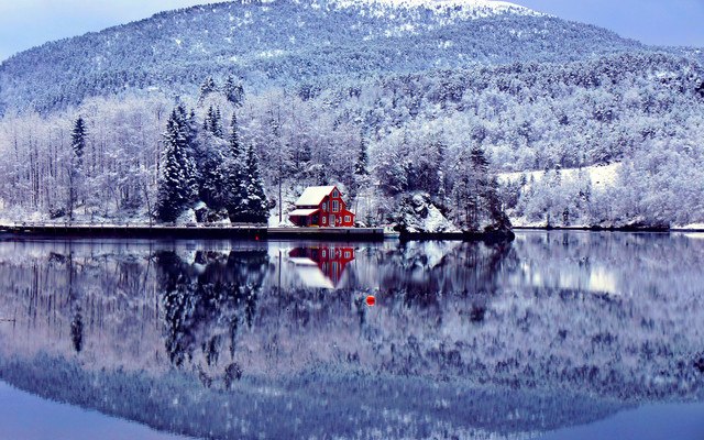 House On The Lake In Winter